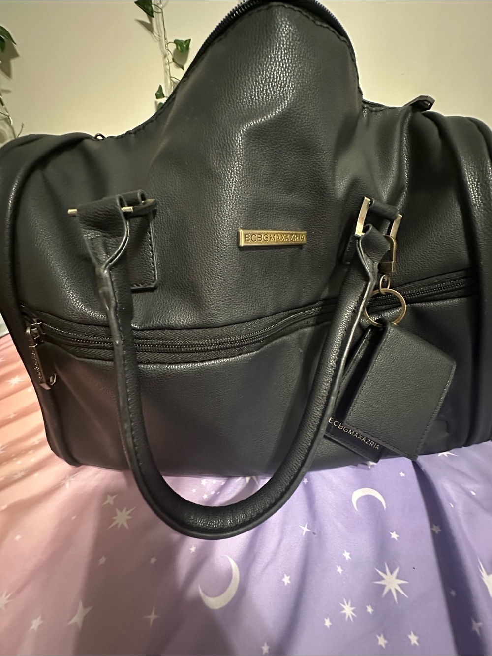 BCBGMaxAzria Black Double-Handle luggage tote with Gold Accent